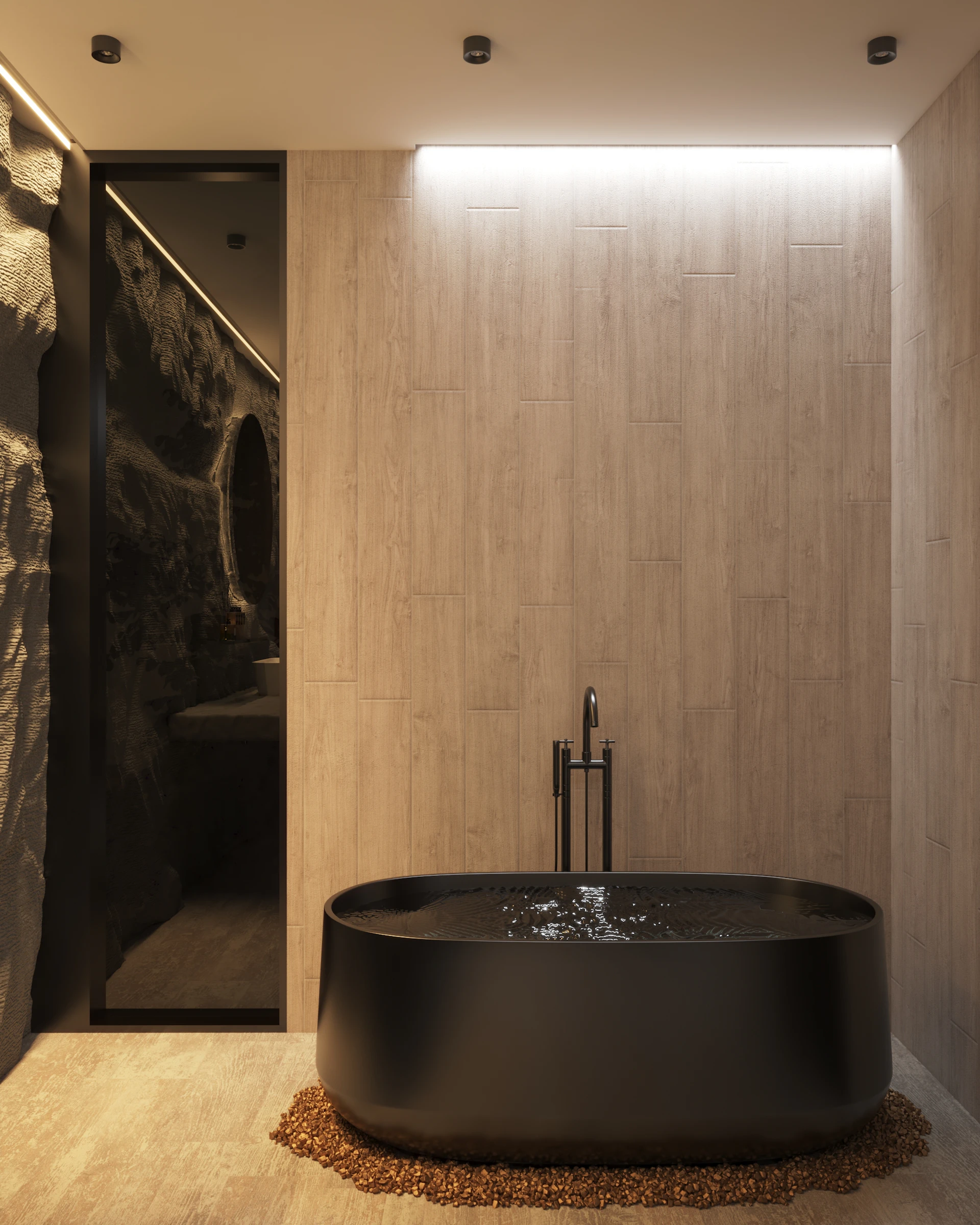 Freestanding black stone bathtub against a textured stone wall and warm timber panelling